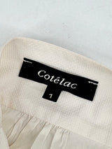 Cotélac Ivory Sleeveless Button-Up Peplum Top - AU8
