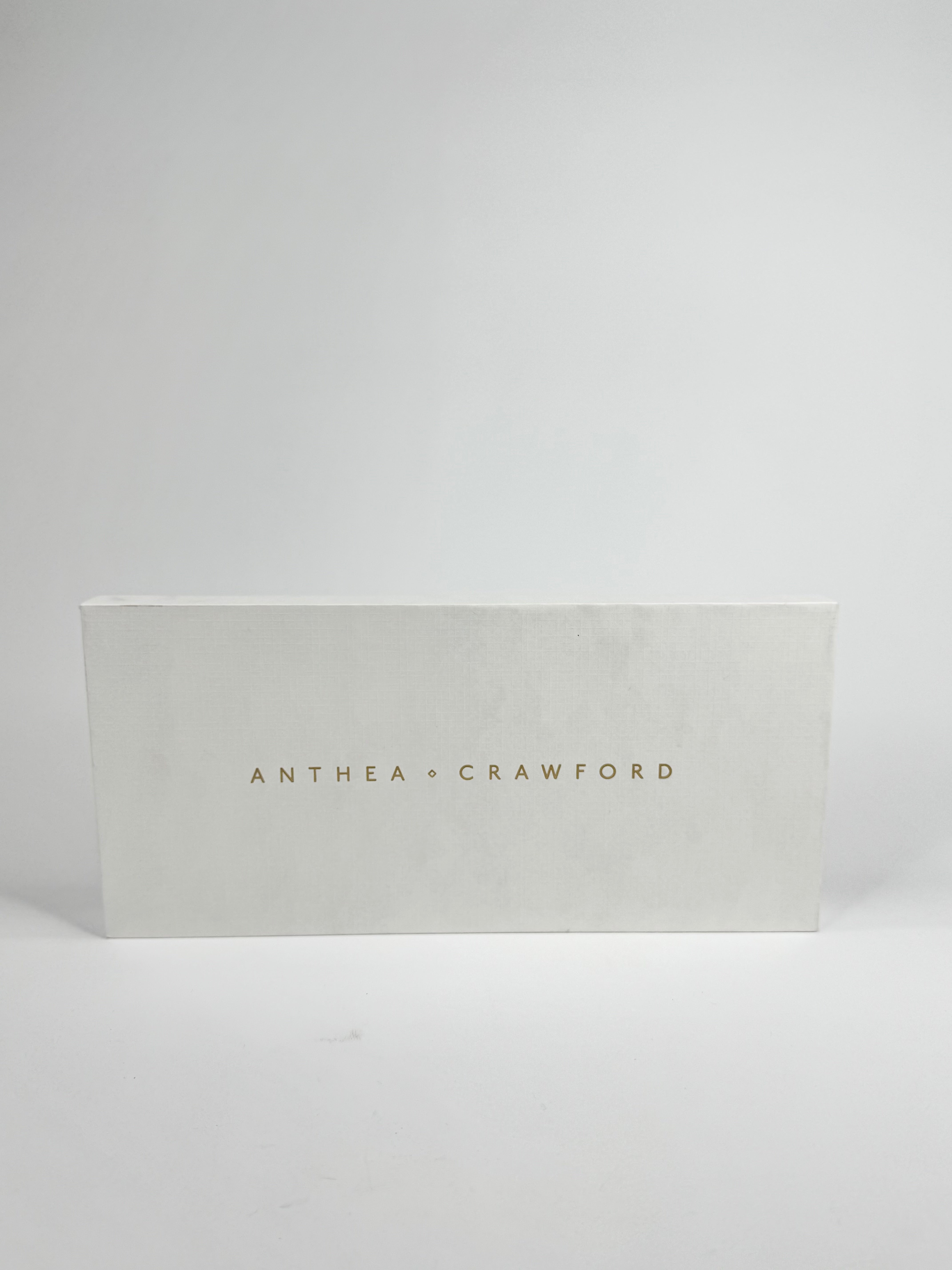 White box with 'Anthea Crawford' branding on a white background