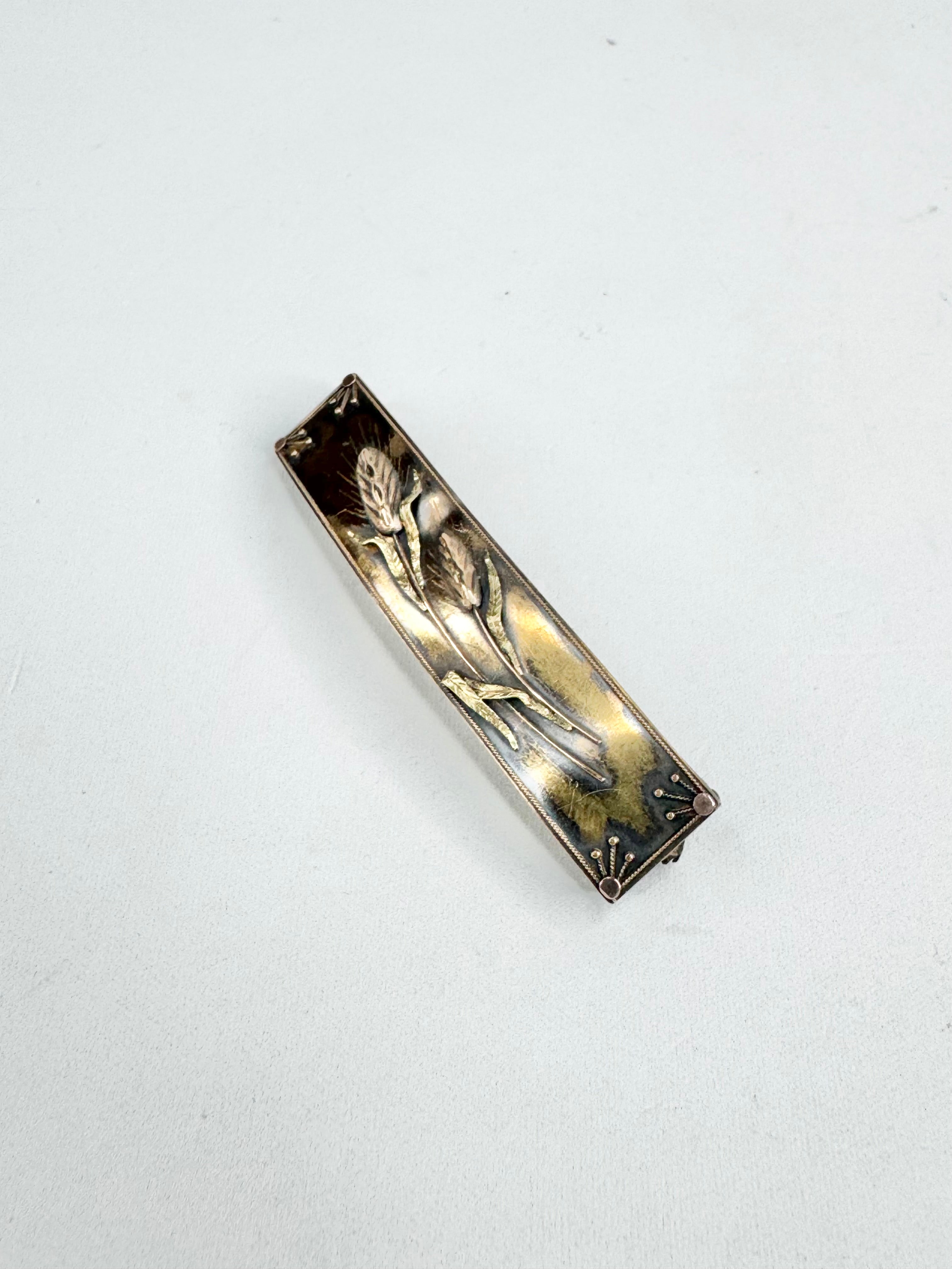 Decorative rectangular object with artistic design on a white background
