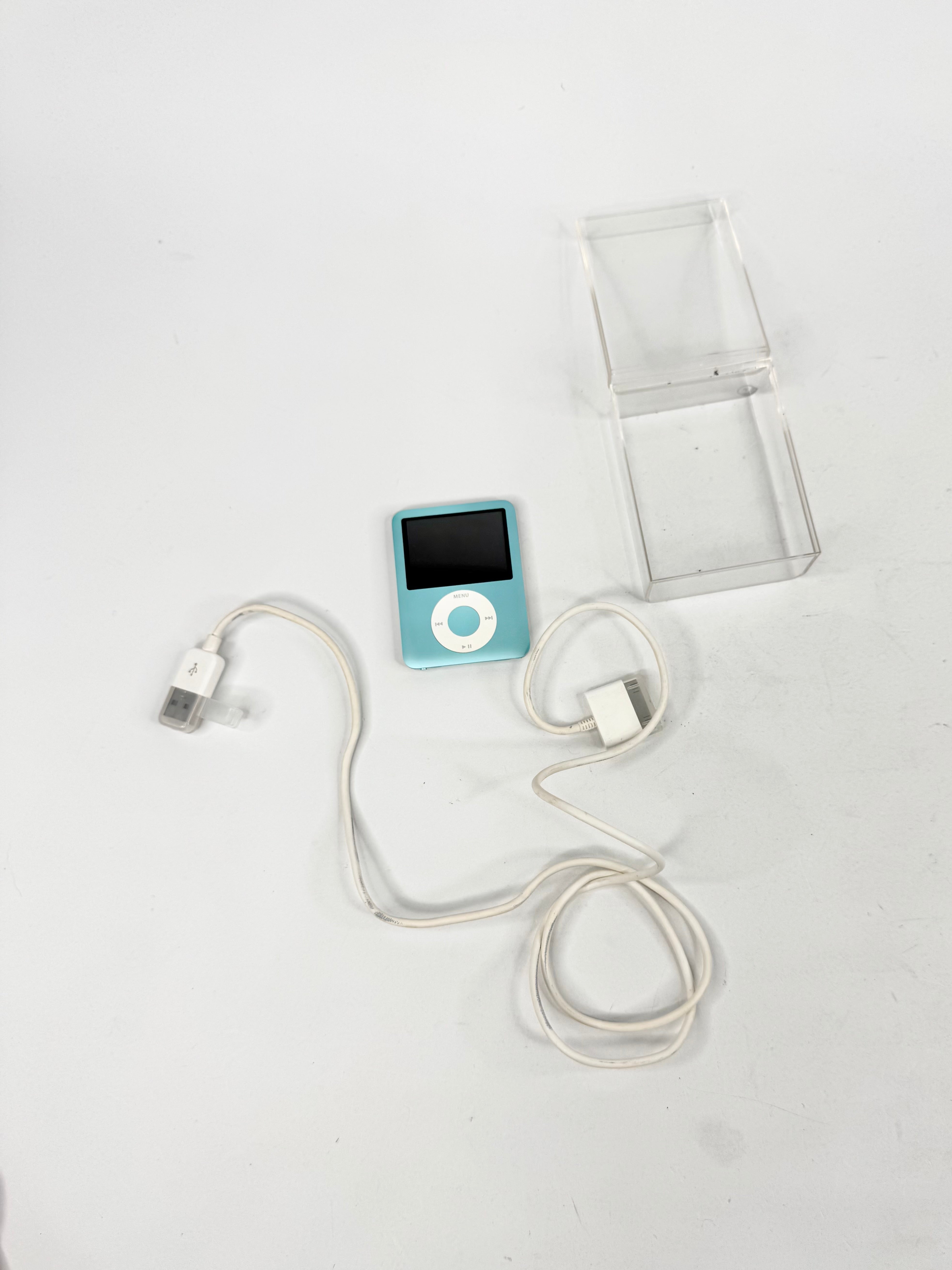 Blue iPod with white cable on a white background