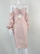 An off-shoulder, form-fitting pink striped dress with a candy-eyed detail on the shoulder, displayed on a mannequin.