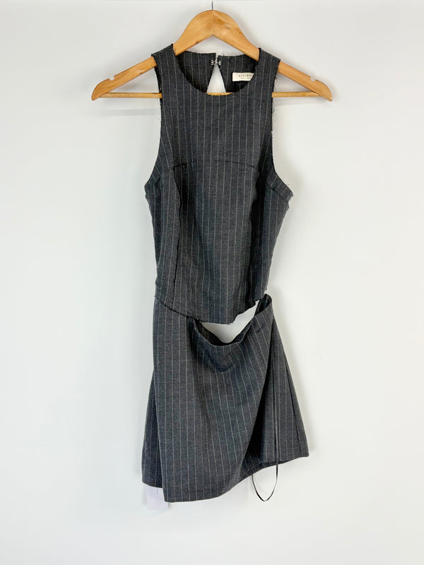 Gray pinstripe Bec + Bridge dress on a hanger against a white background