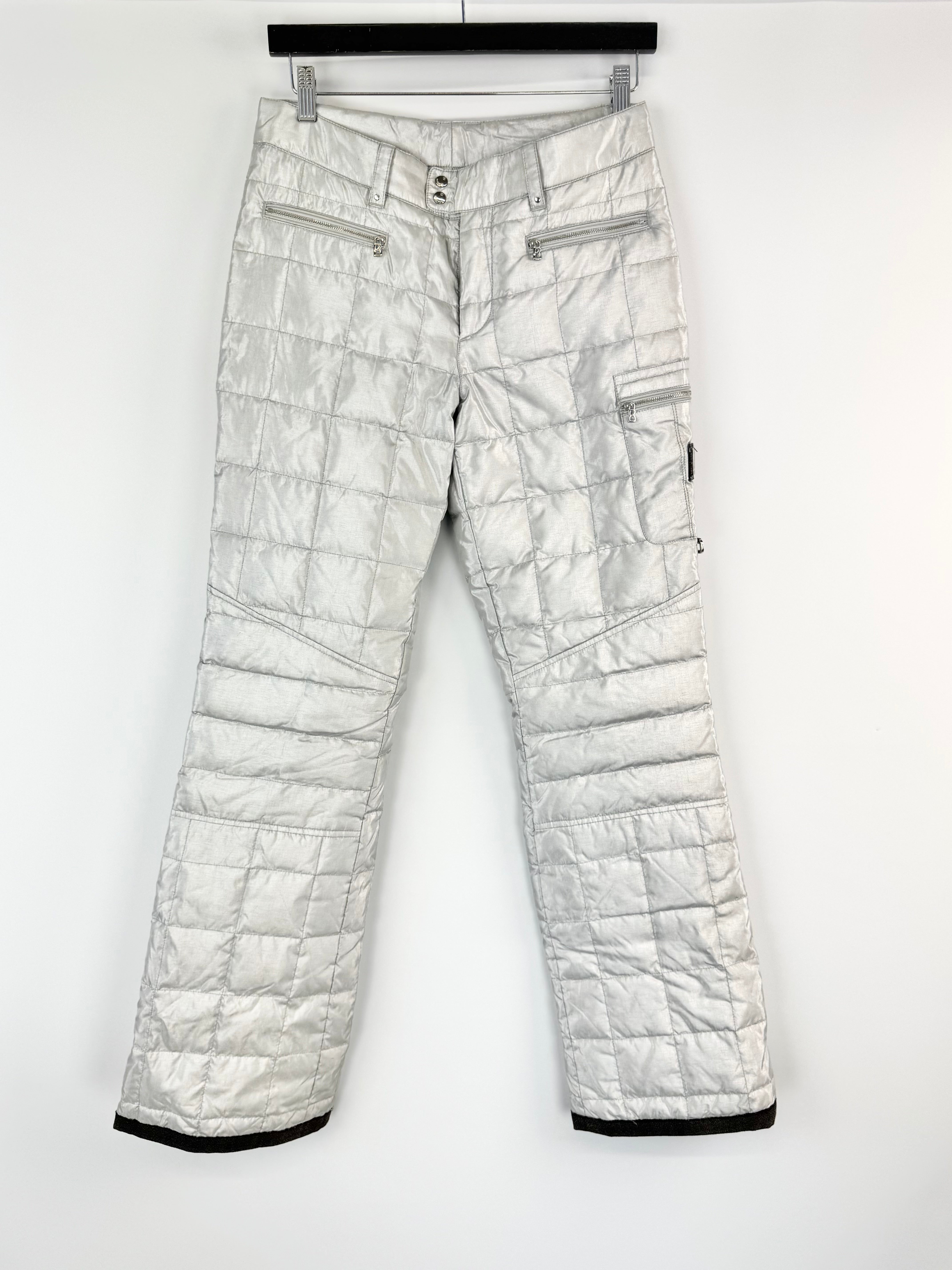 White quilted pants with a subtle pattern on a white background