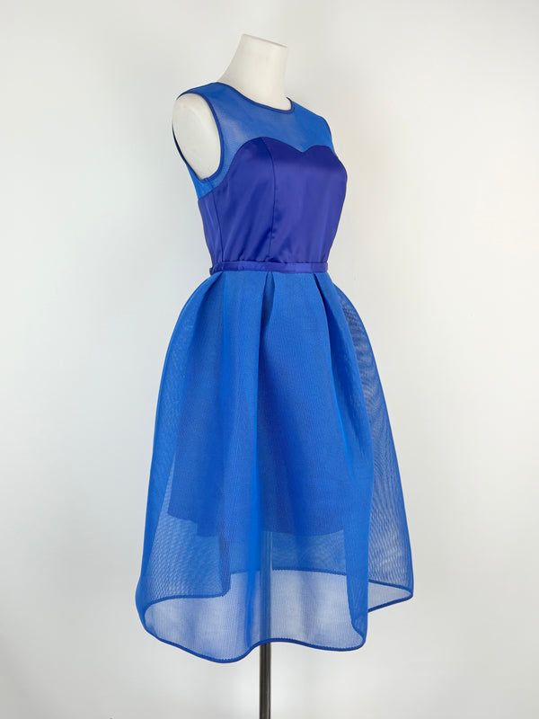 Blue dress on a mannequin against a white background