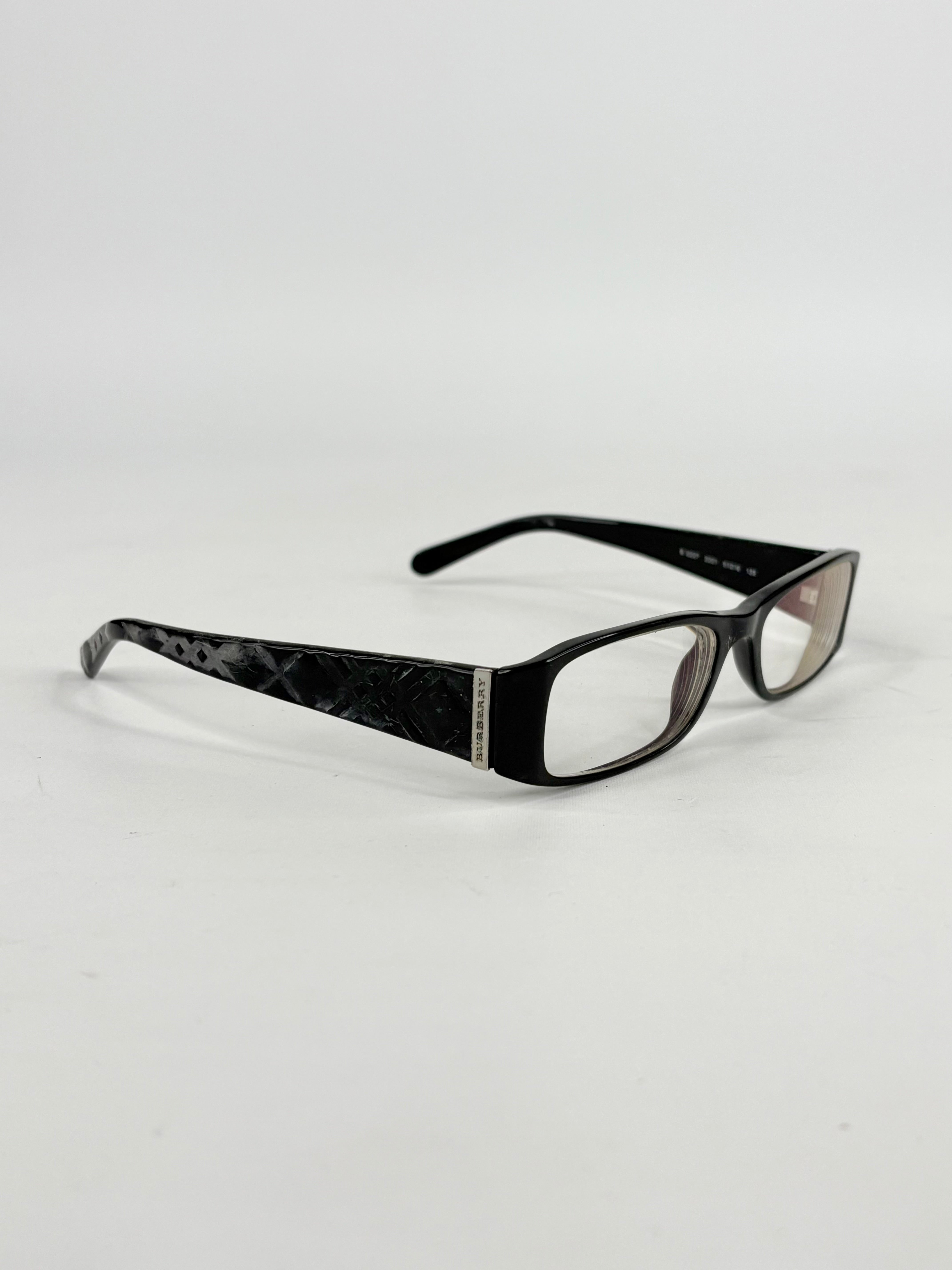 Black eyeglasses on a white background
