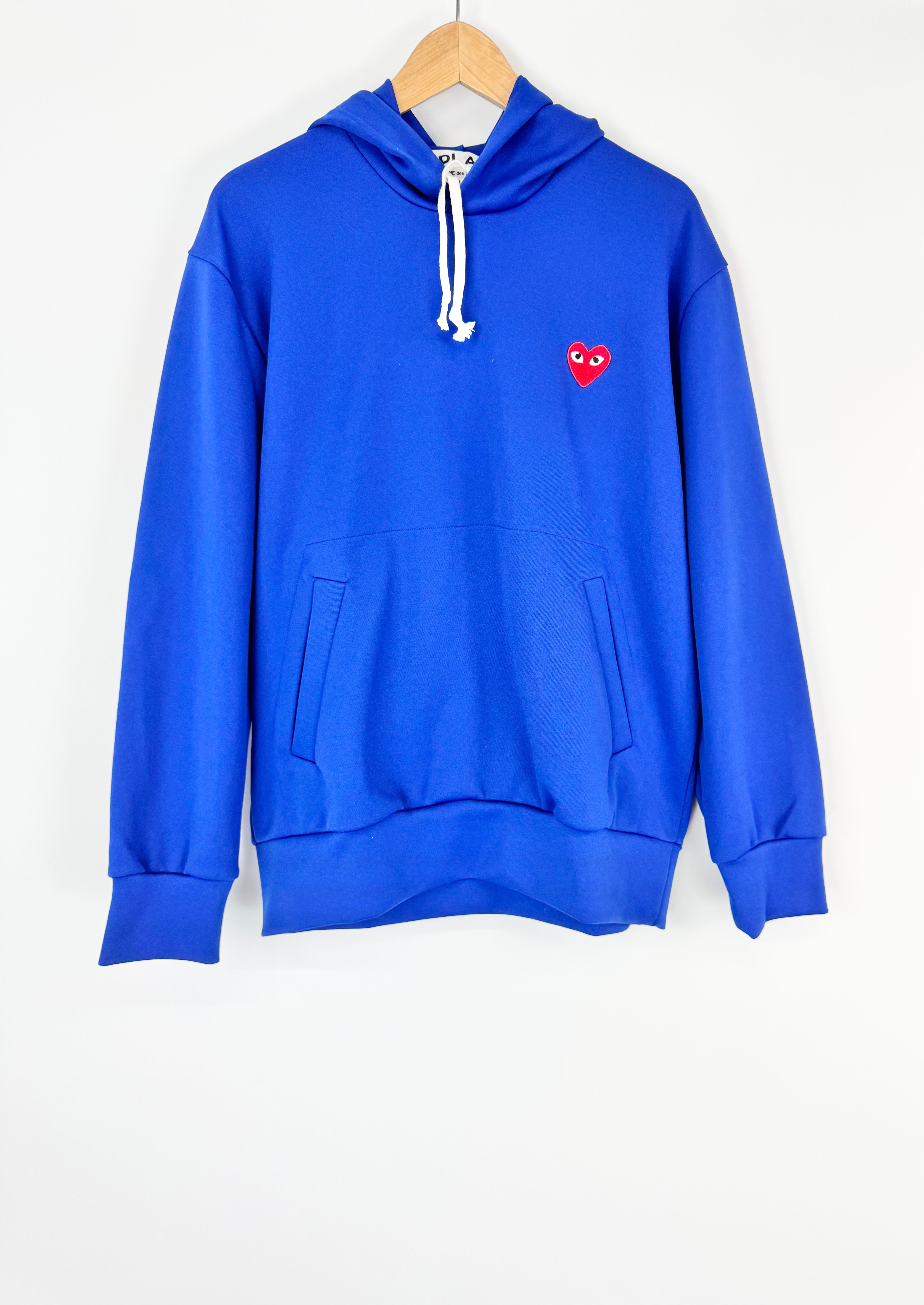 Blue hoodie with a red heart logo on a white background
