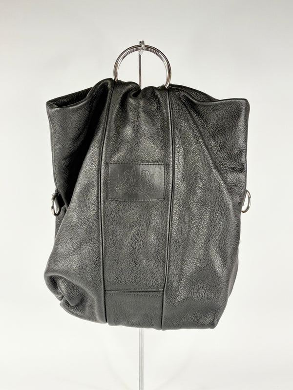 Black leather handbag on a white background