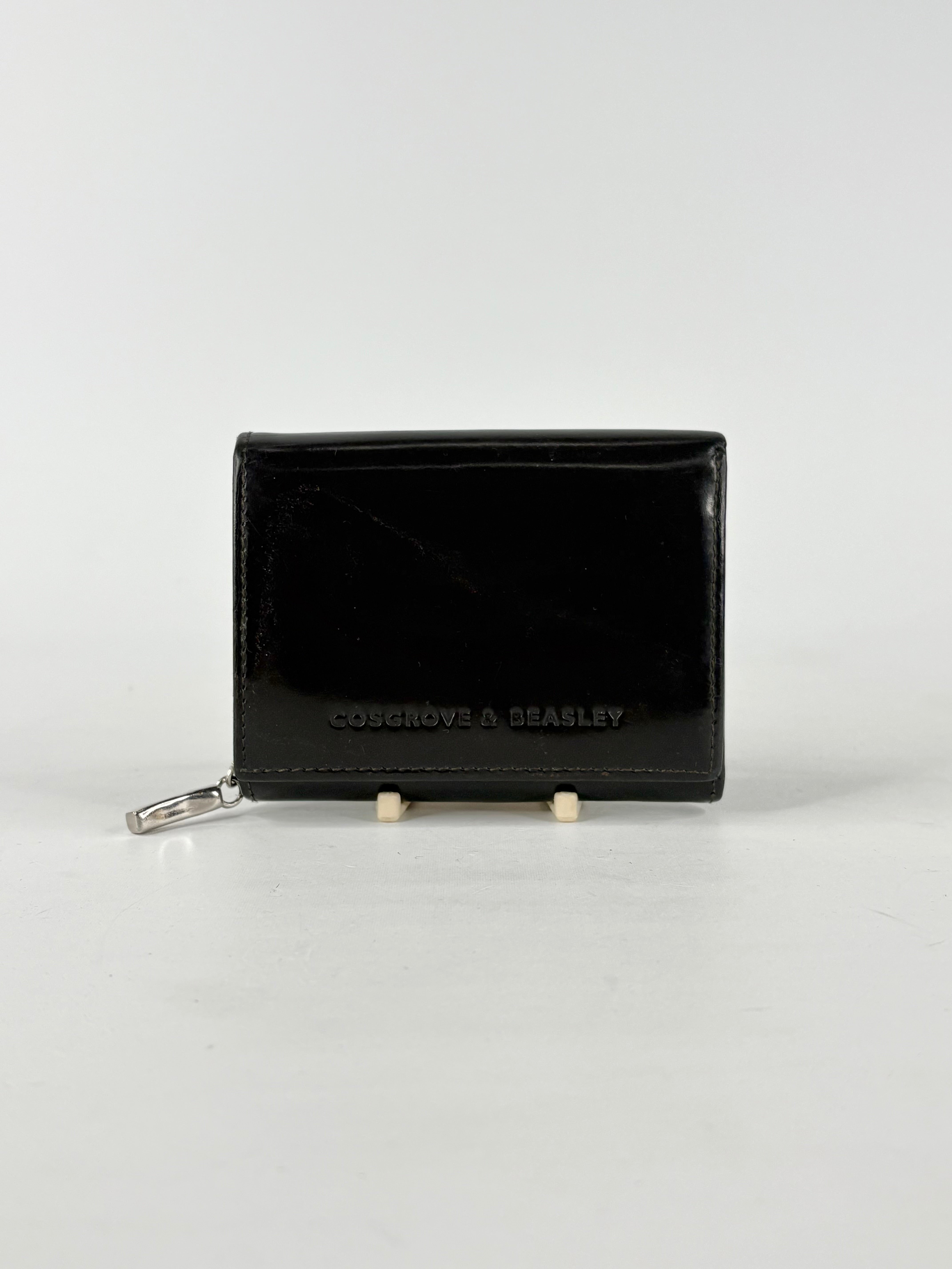 Black wallet with 'Cosgrove & Colesley' branding on a white background