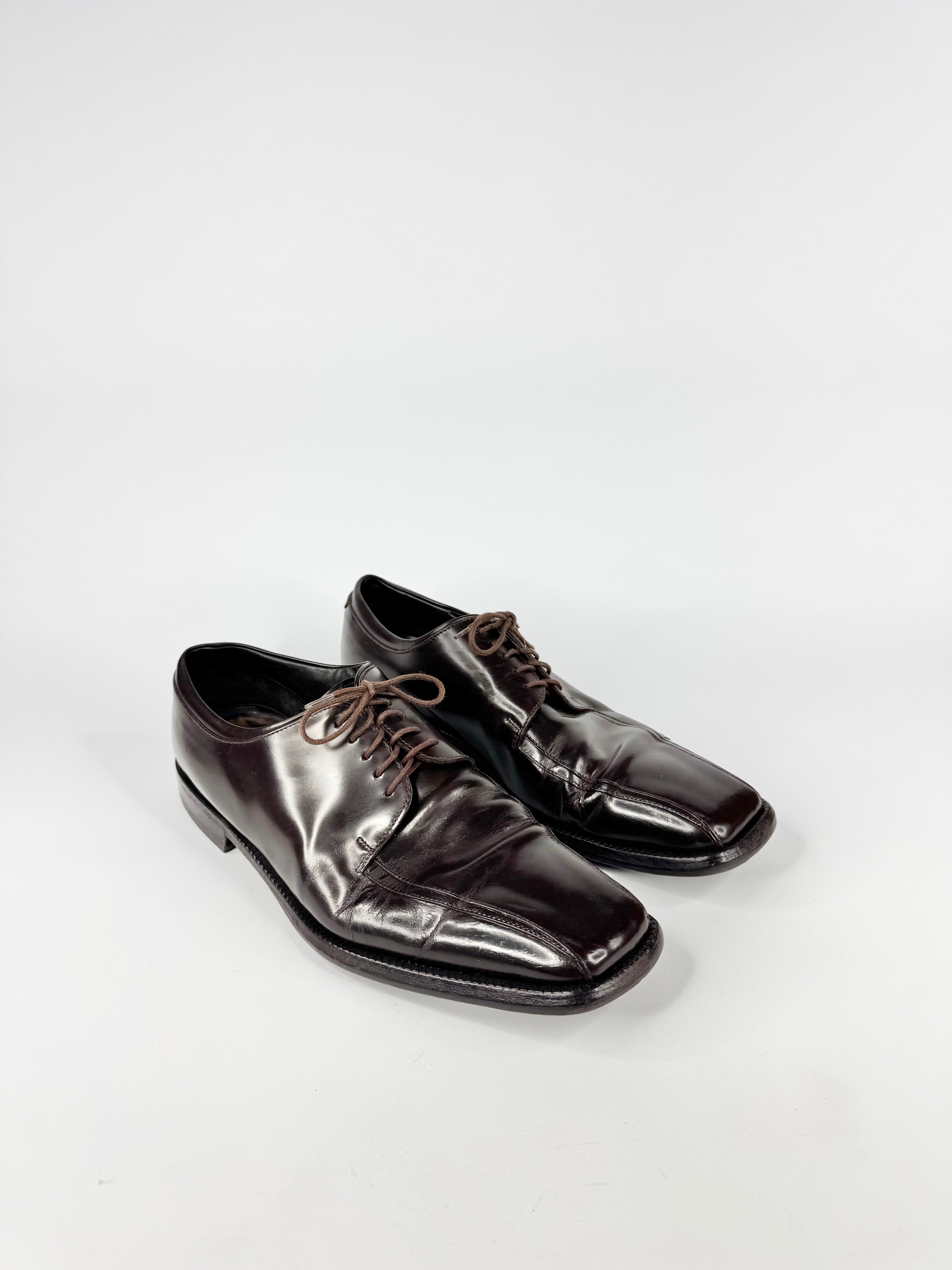 Pair of brown leather shoes on a white background