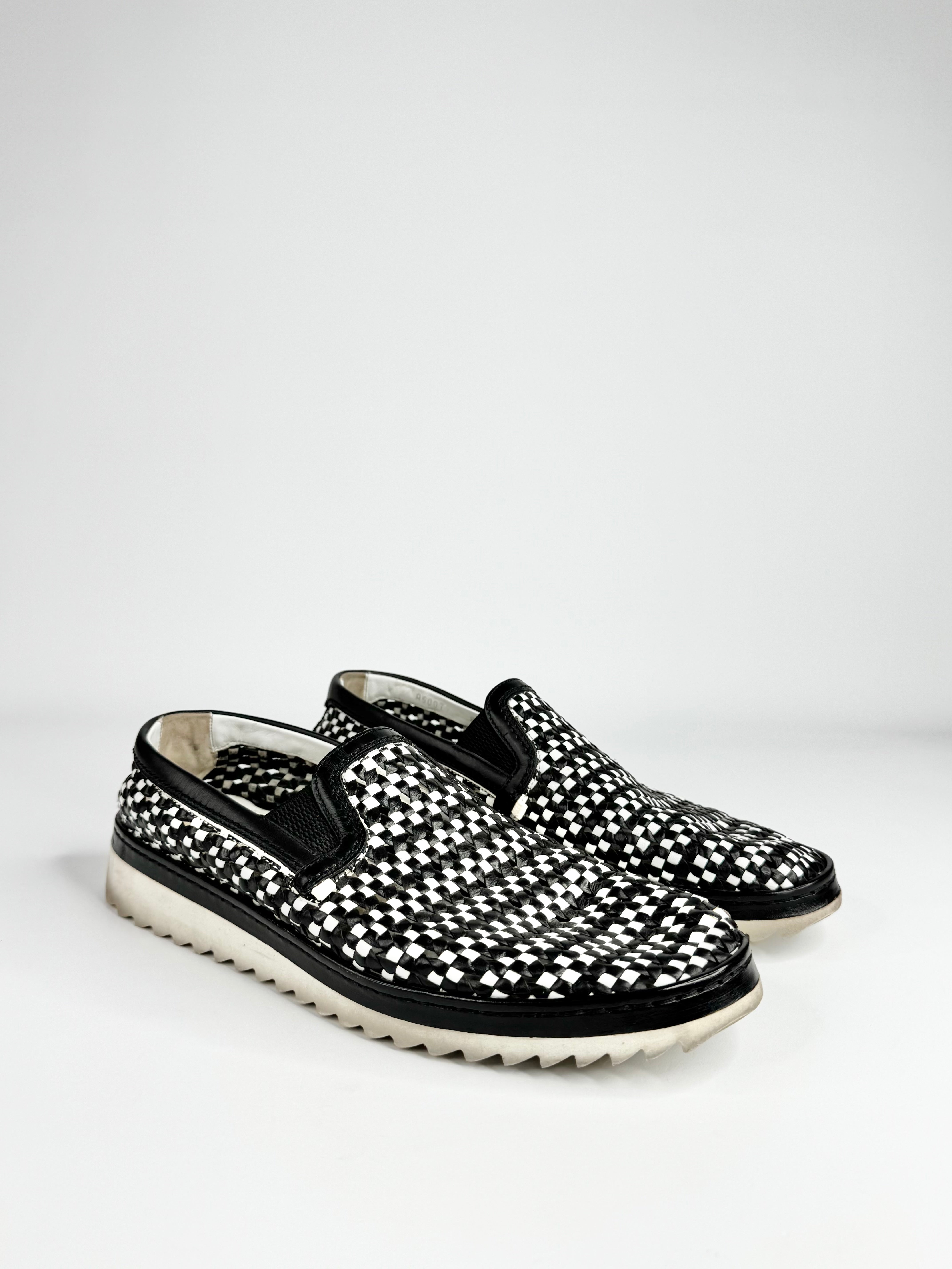Black and white patterned shoes on a white background