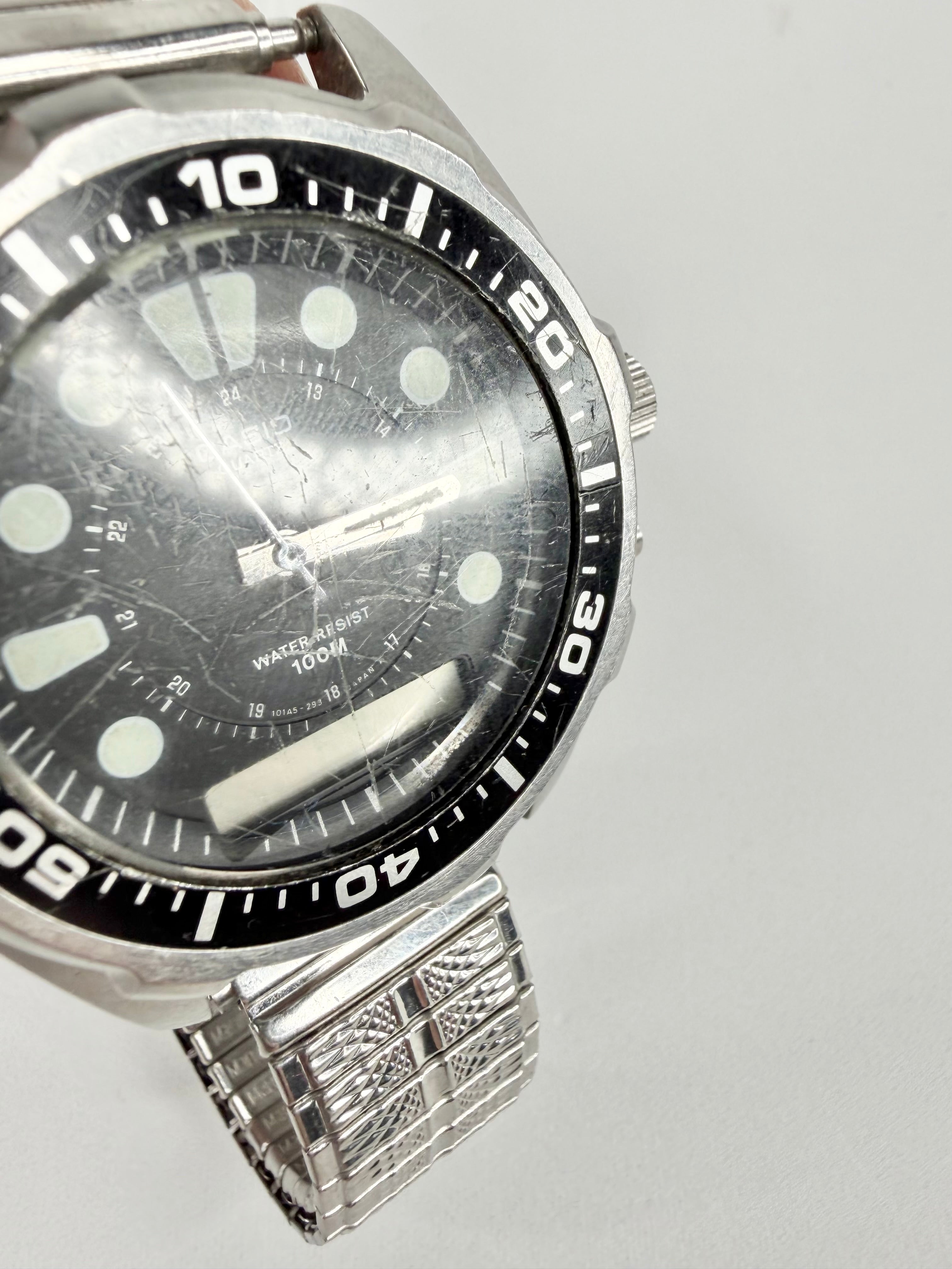 Vintage Casio Silver AQ-600W Ana-Digi Watch