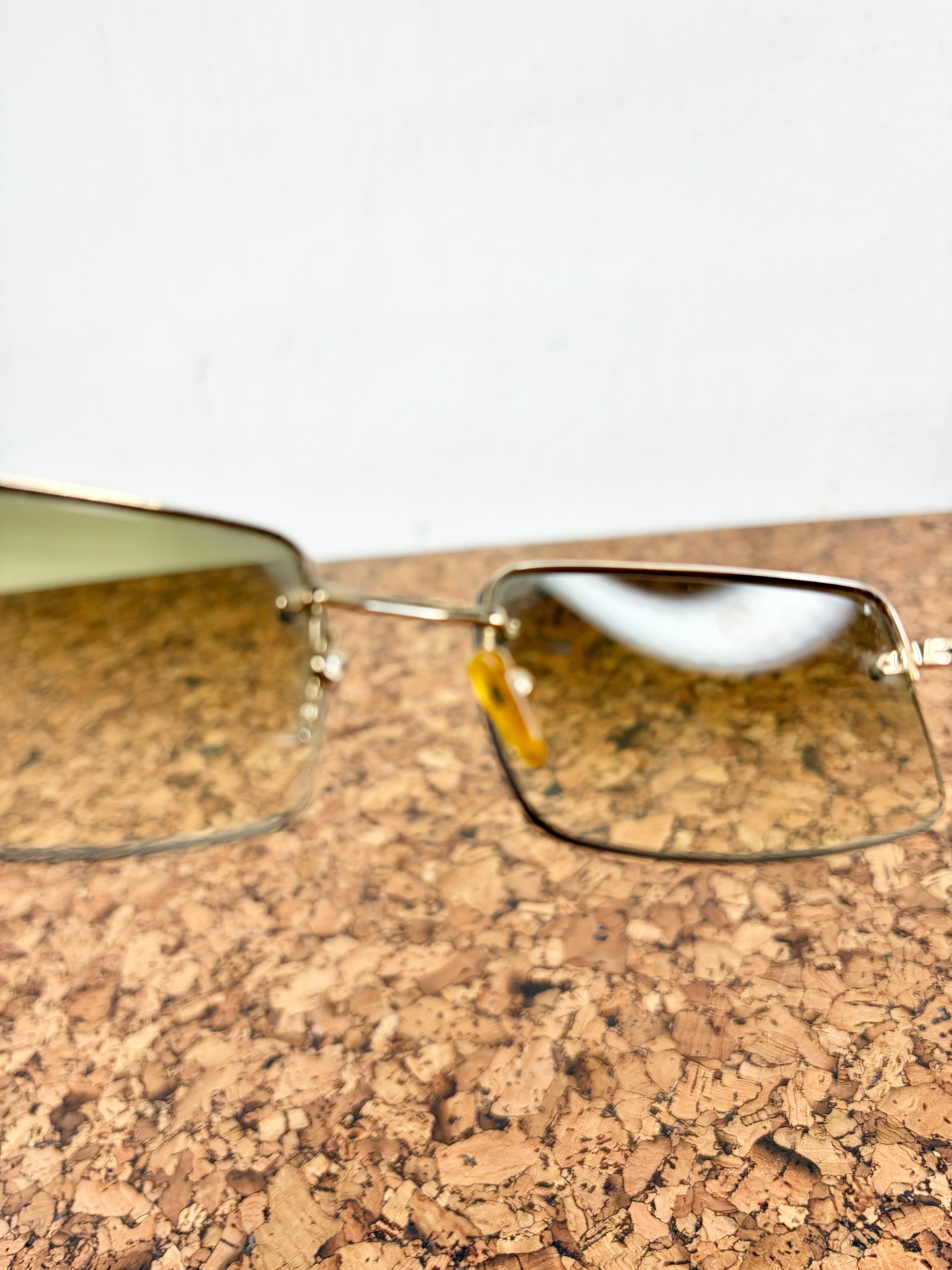 Gucci GG1653/S Gold Rimless Sunglasses