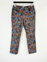 Colorful patterned pants on a white background
