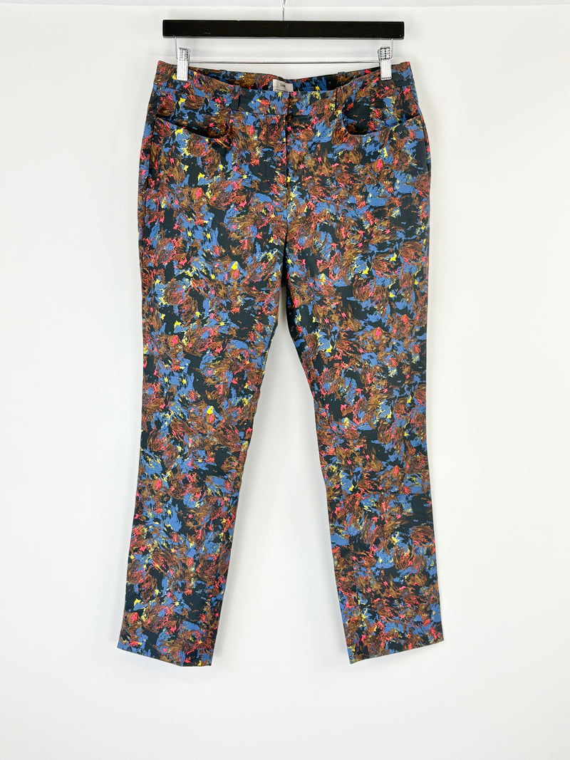 Colorful patterned pants on a white background