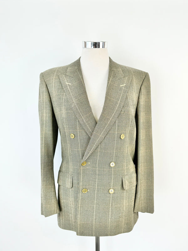 Double breasted wool blazer in a glen plaid check pattern, gold olive hue, displayed on a mannequin