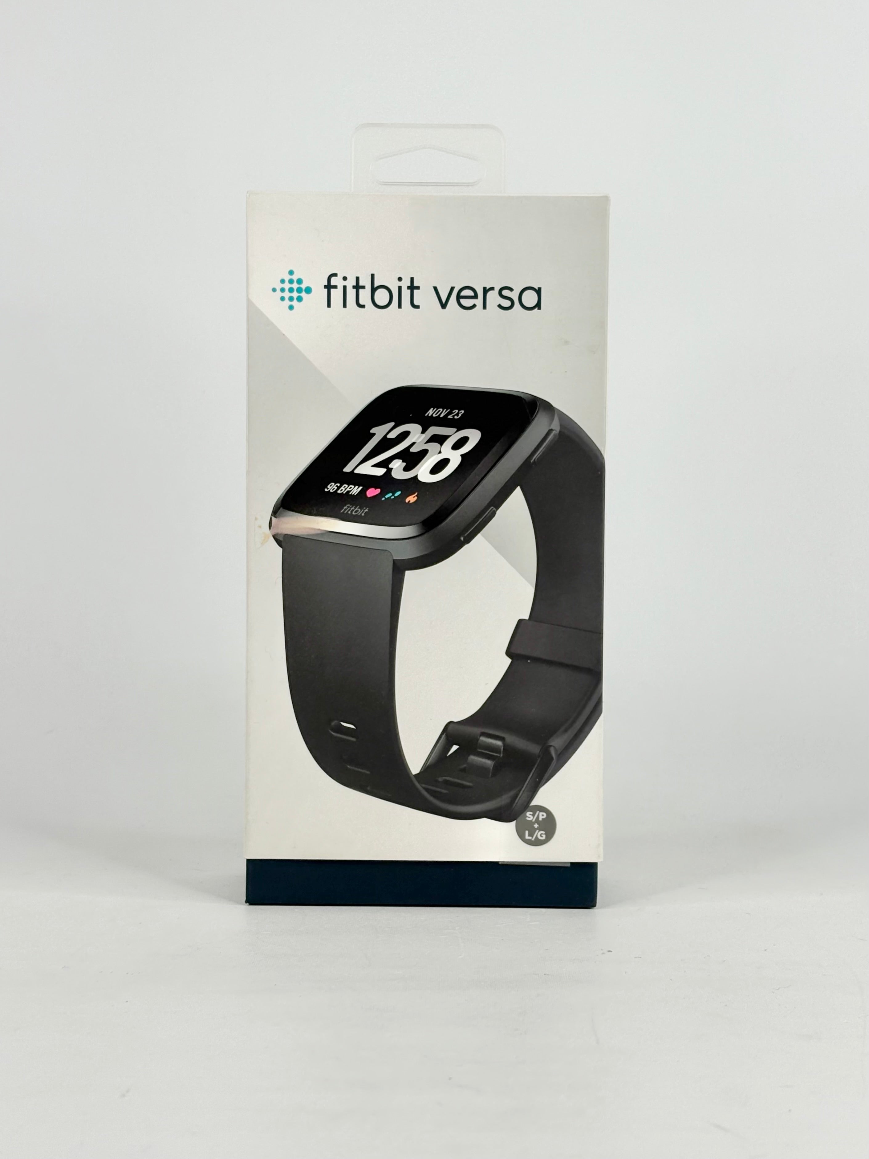 Fitbit Versa smartwatch packaging on a white background