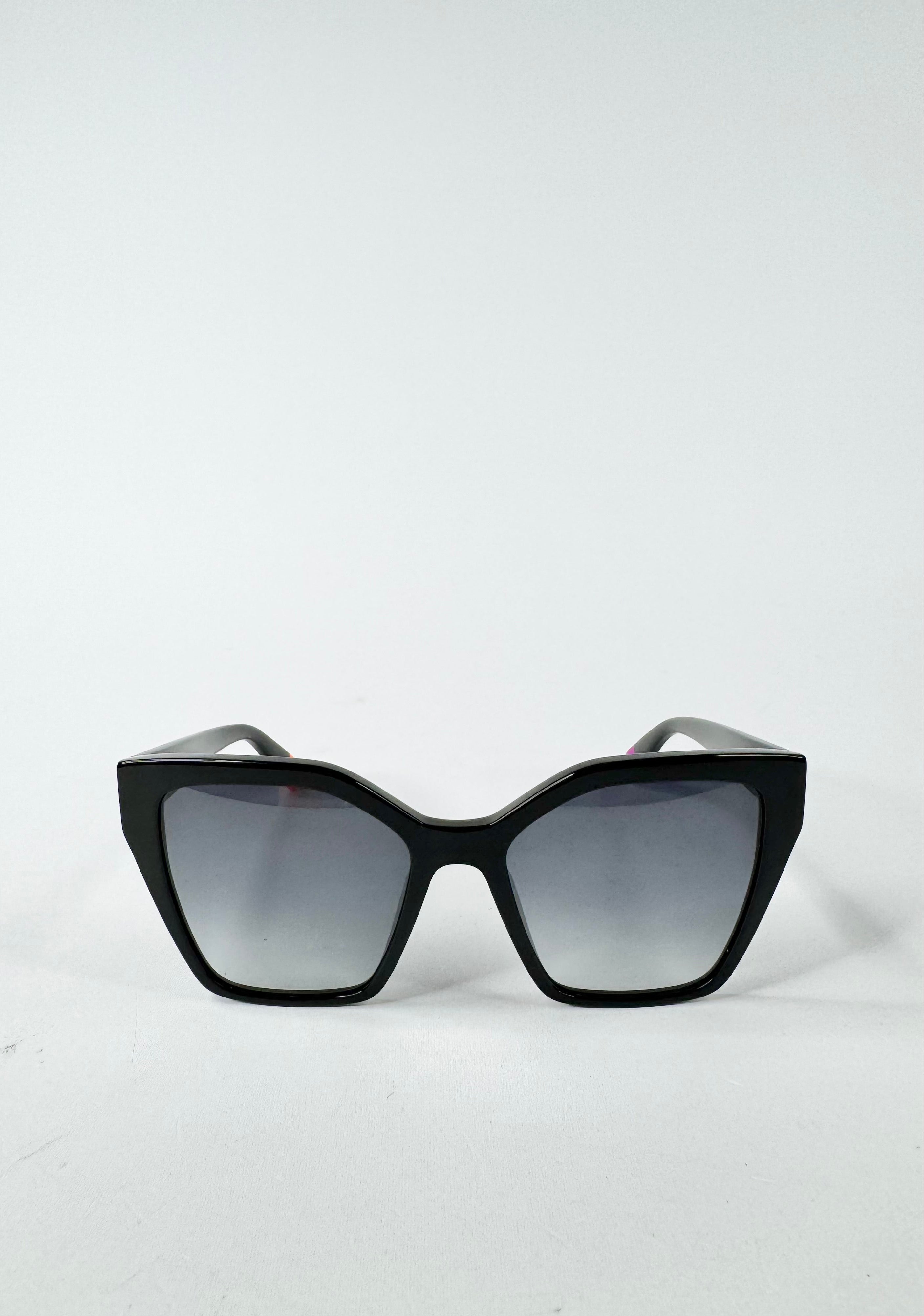 Black cat-eye sunglasses with gradient lenses on a white background
