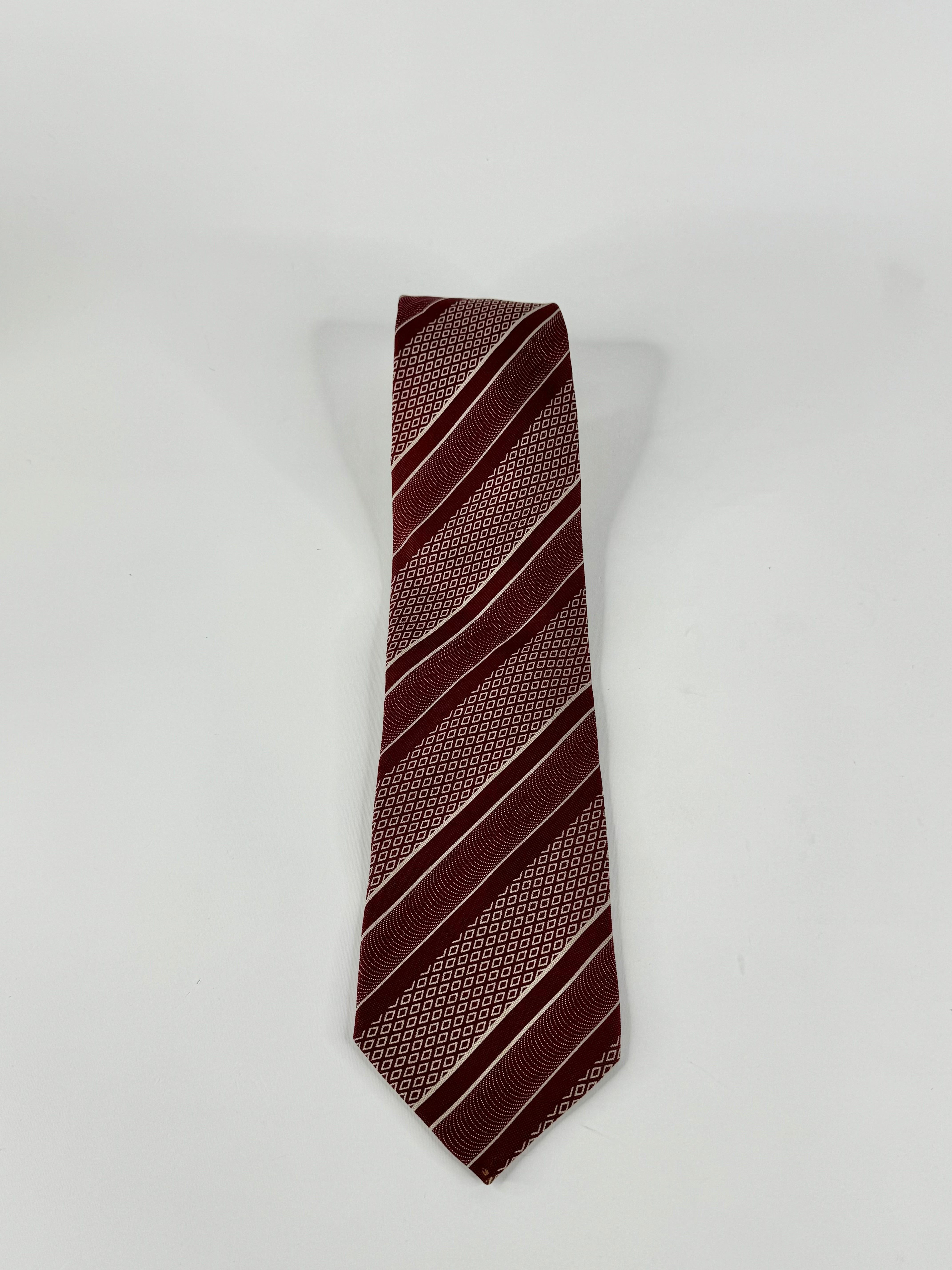 A red and white striped silk tie with a muted red color and a soft white/cream pattern.