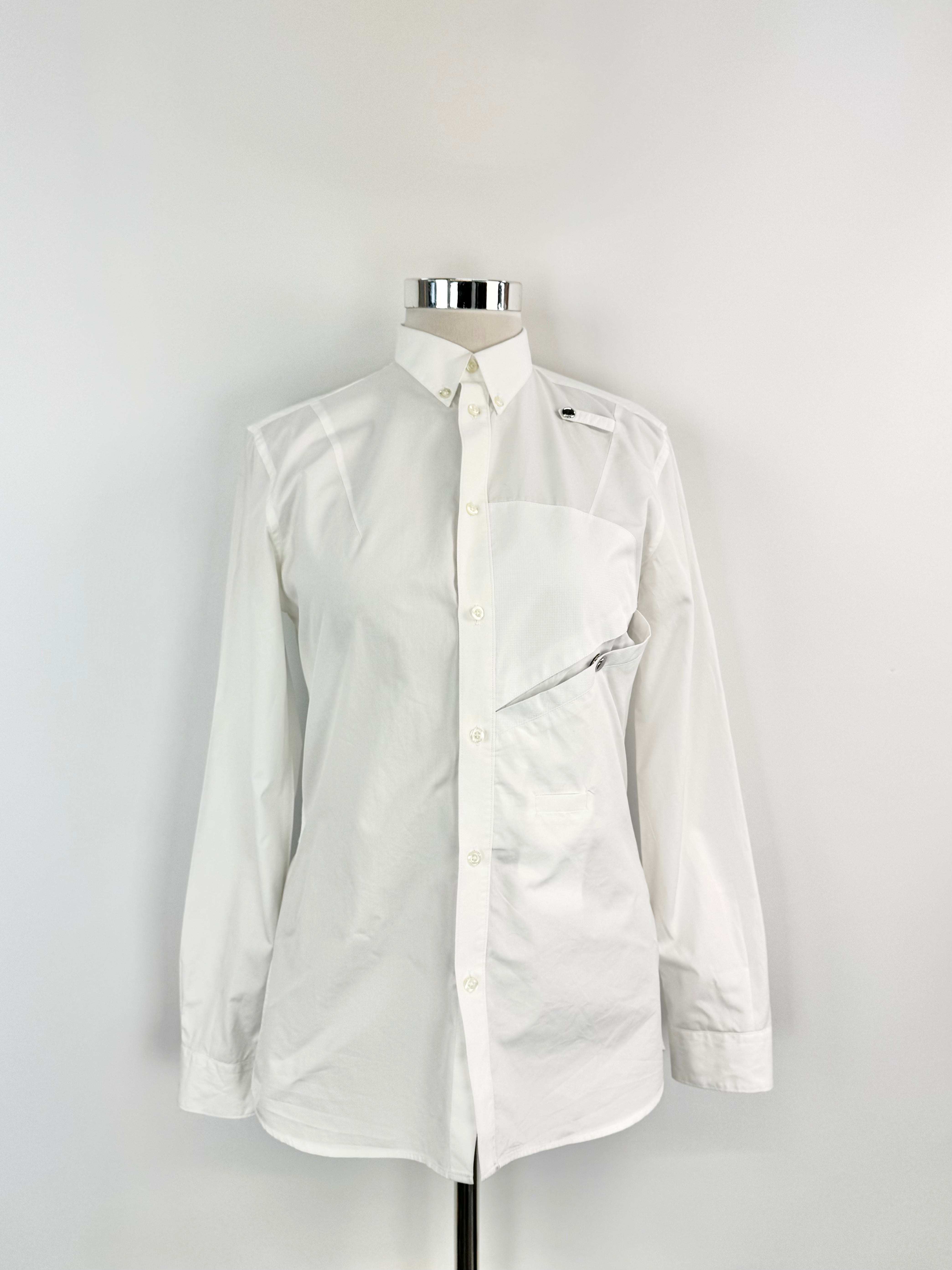 White shirt on a mannequin against a white background
