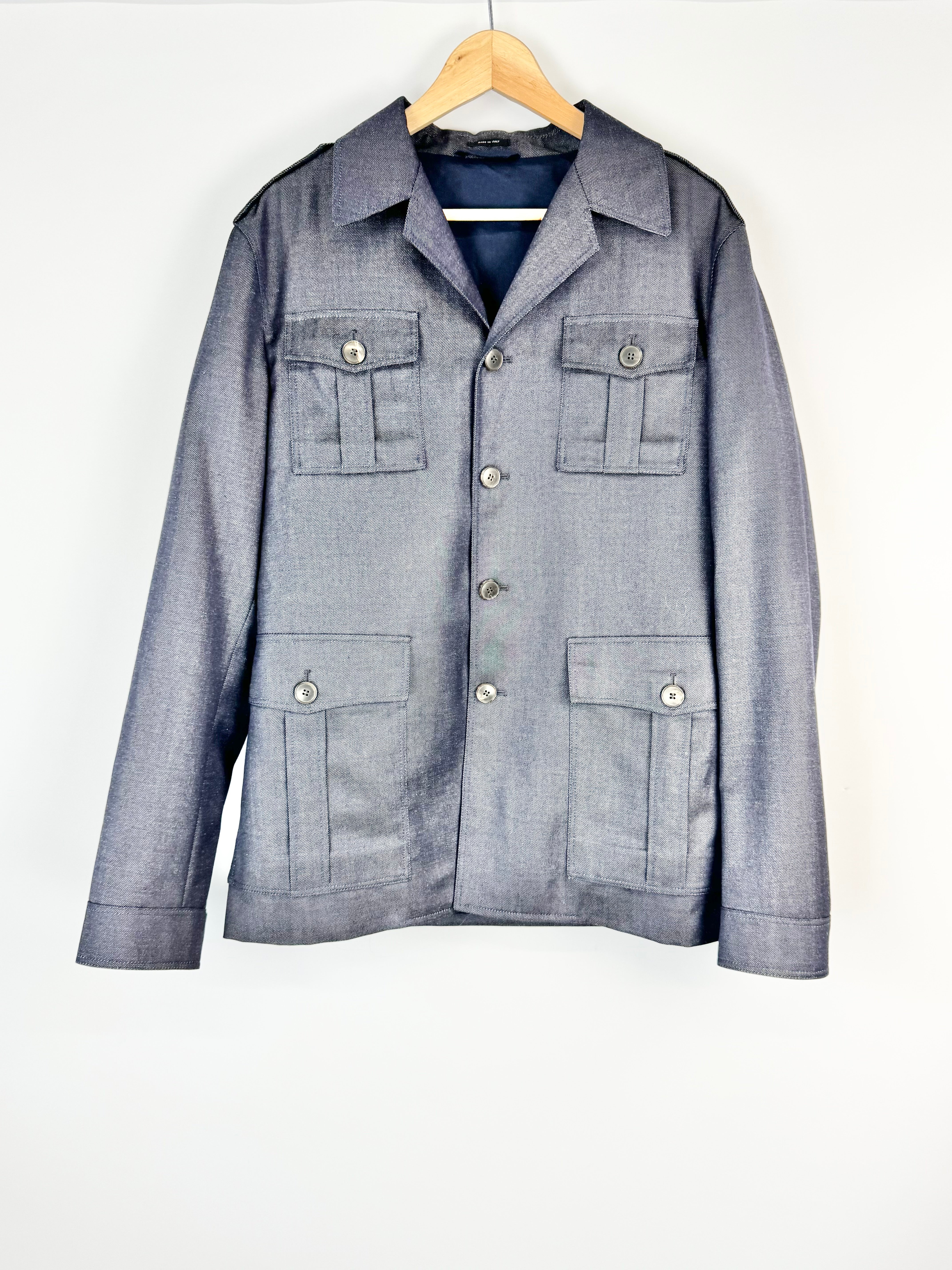 Gray jacket with button details on a white background