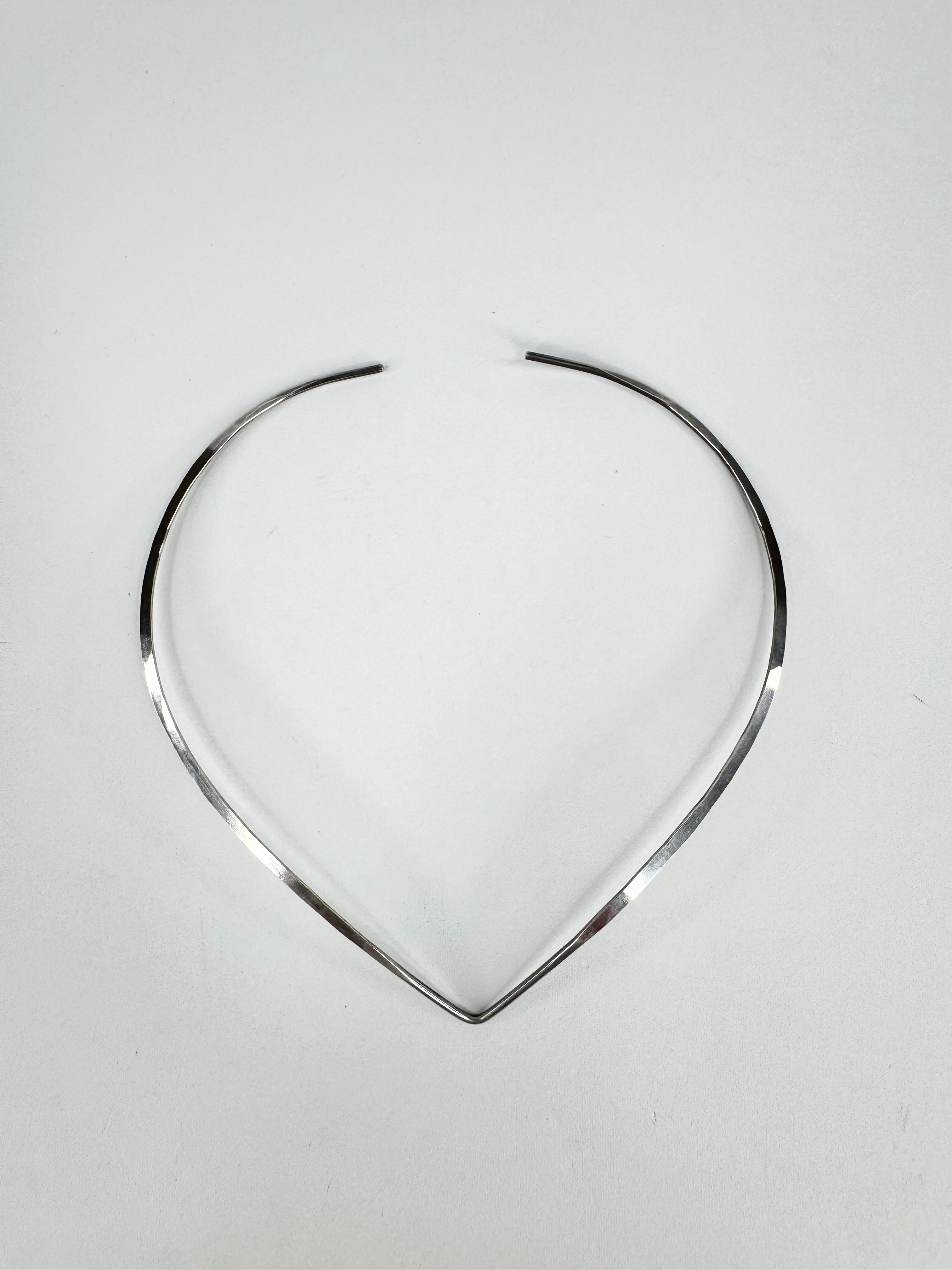 Silver necklace on a white background