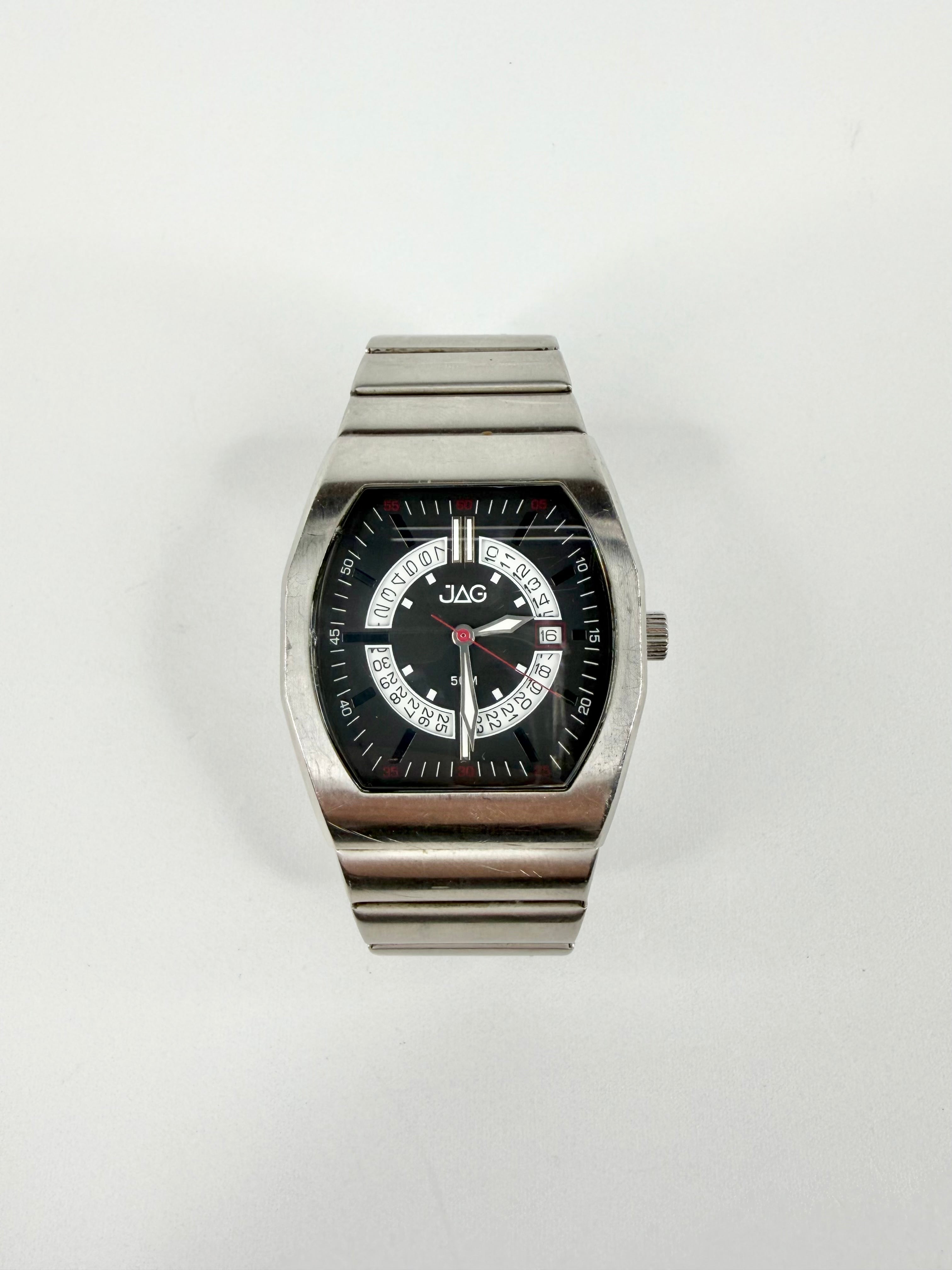 Silver watch with a black face on a white background