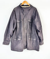Gray jacket on a hanger against a white background