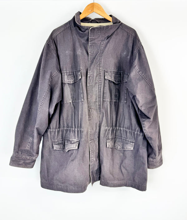Gray jacket on a hanger against a white background
