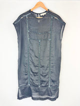 Blue denim dress on a wooden hanger against a white background