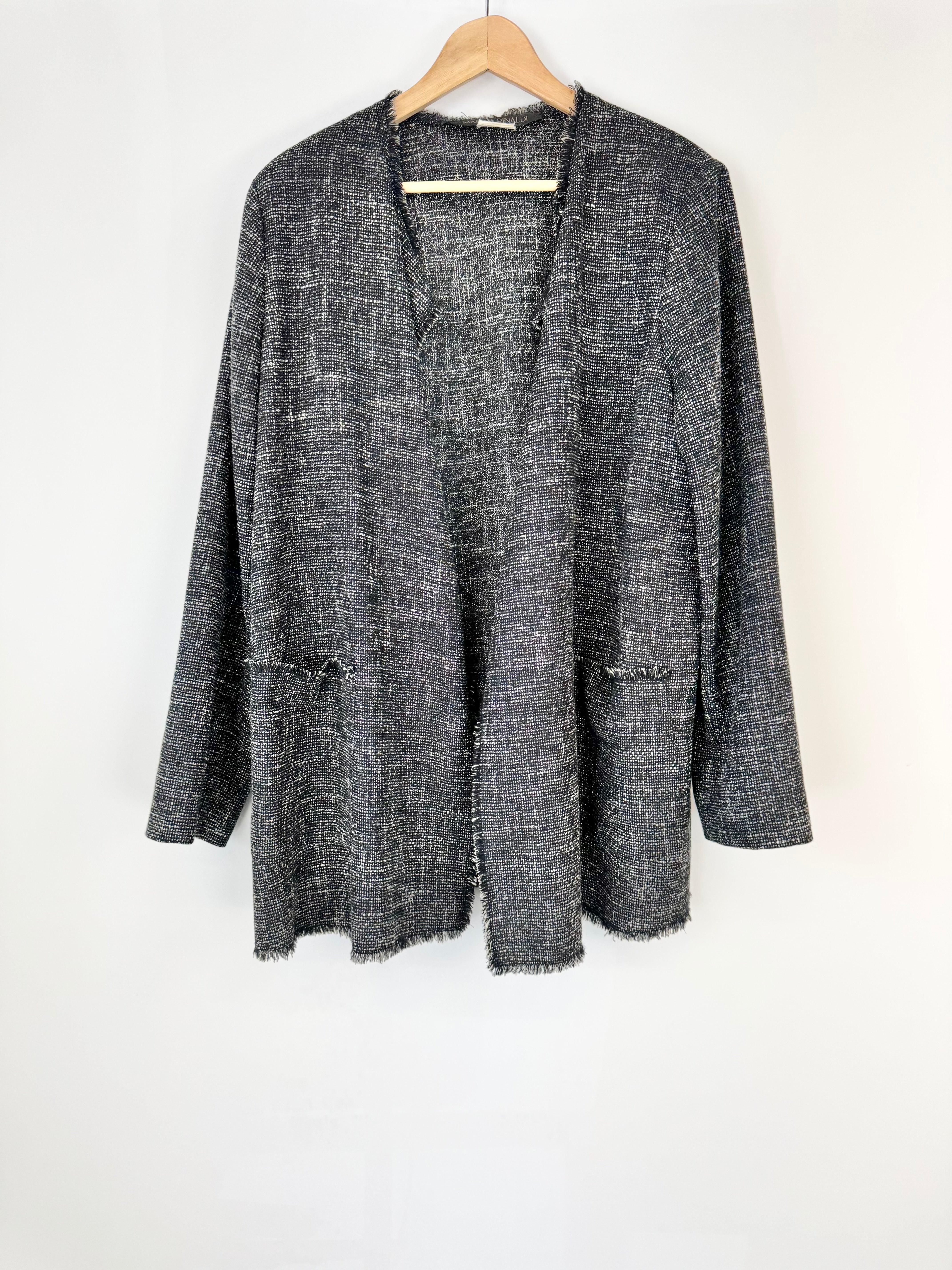 Textured gray blazer on a hanger against a white background