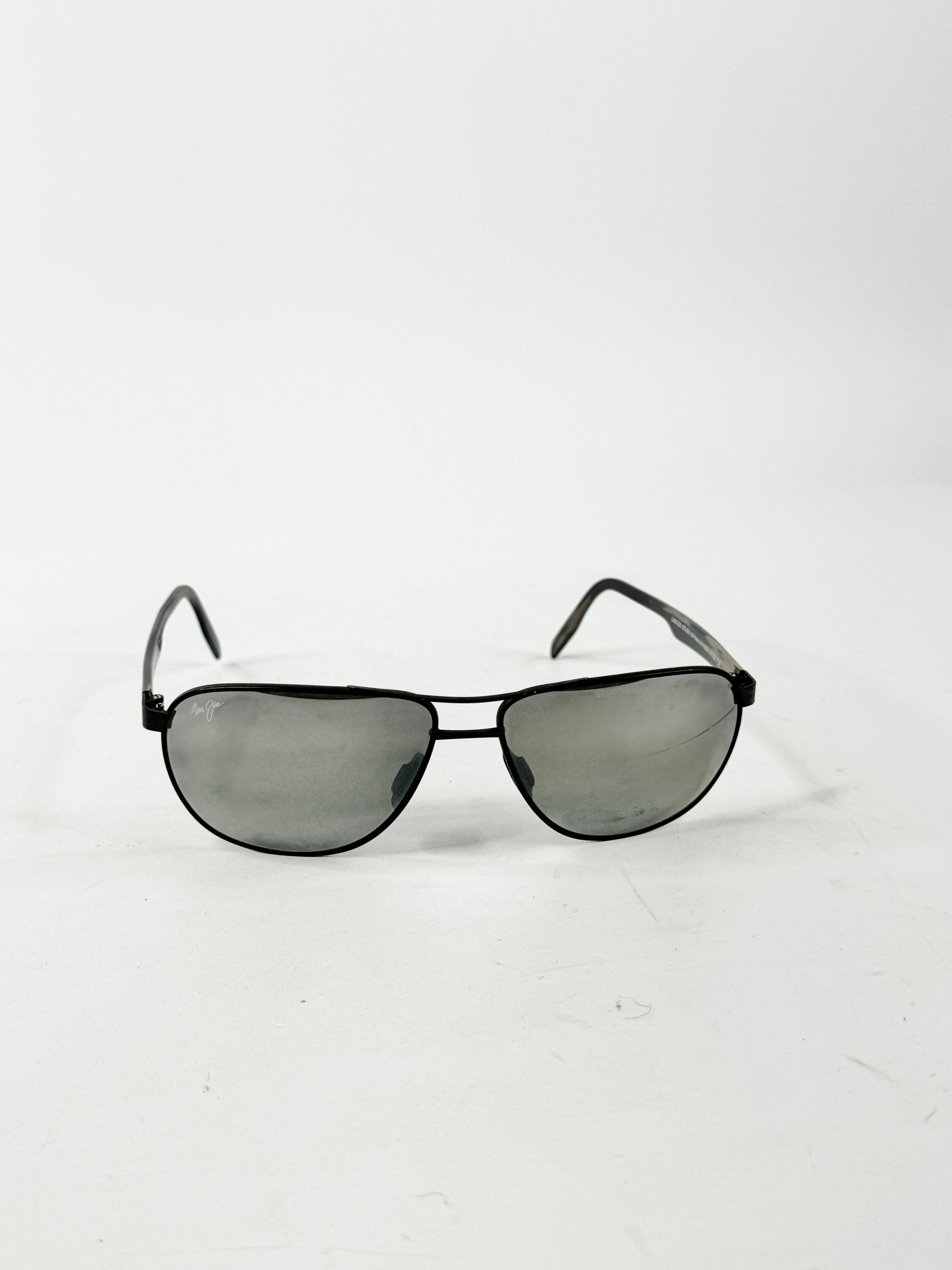 Black aviator sunglasses with reflective lenses on a white background