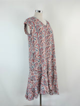 Paisley patterned dress on a mannequin against a white background
