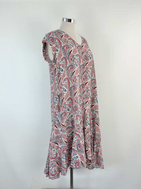Paisley patterned dress on a mannequin against a white background