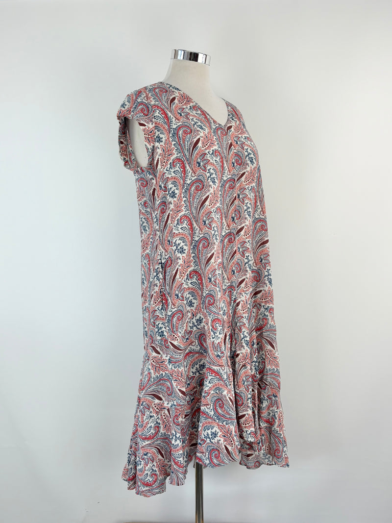 Paisley patterned dress on a mannequin against a white background
