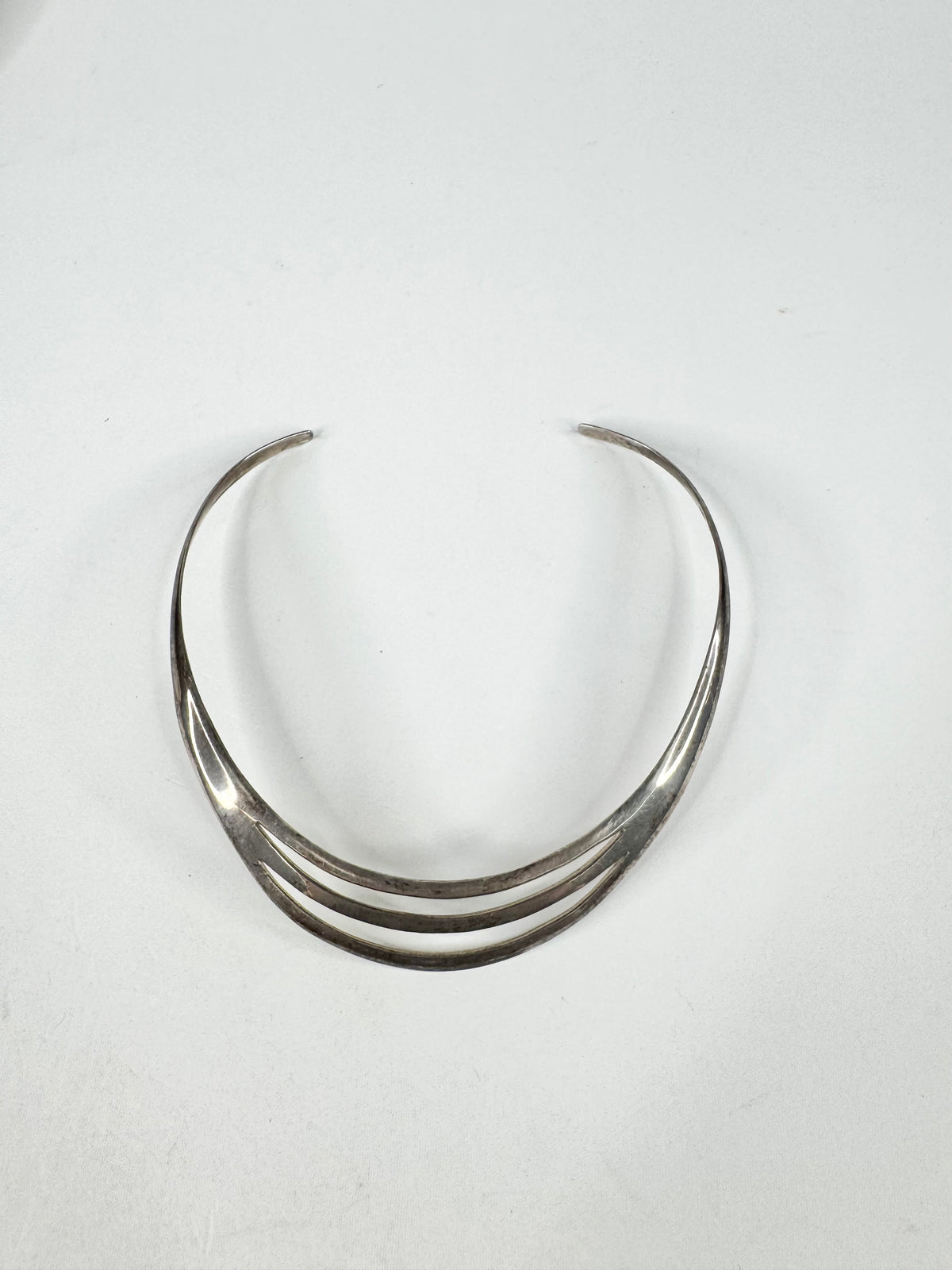 Silver necklace on a white background
