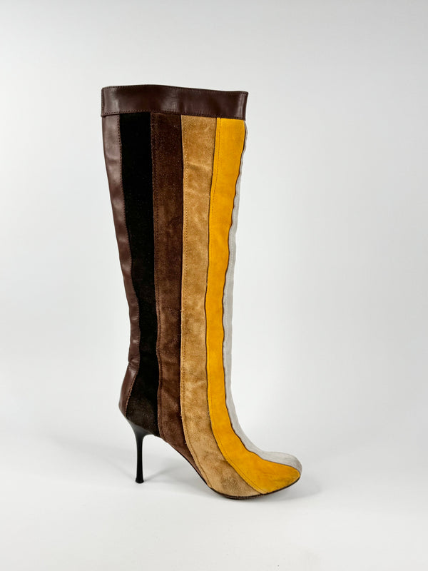 Color-blocked knee-high boots on a white background