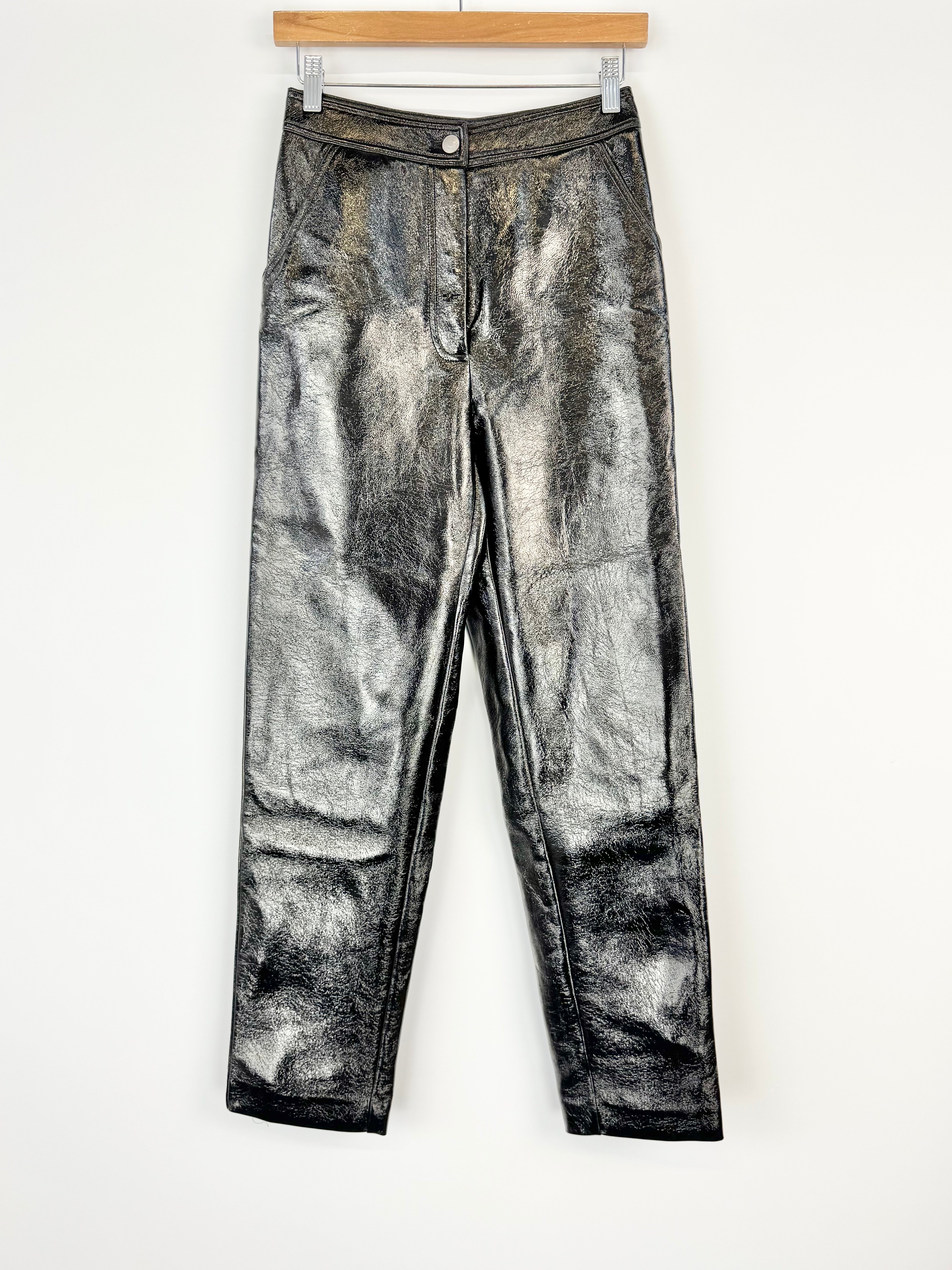 Black acid-wash jeans on a white background