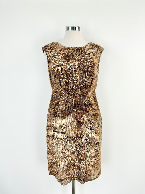 A brown animal patterned midi dress on a mannequin, size AU12/14.
