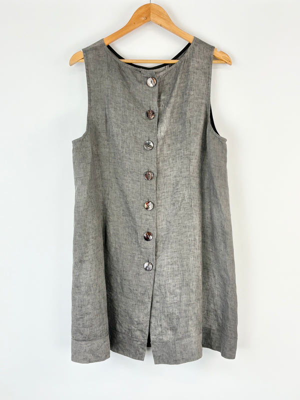 Gray sleeveless Nicola Waite button-up dress on a wooden hanger against a white background