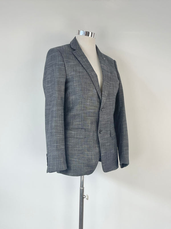 Charcoal striped blazer on a mannequin against a white background.