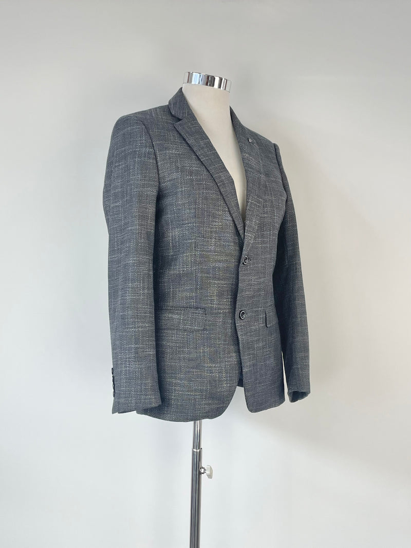 Charcoal striped blazer on a mannequin against a white background.