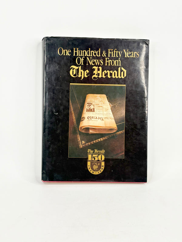 Book cover of 'One Hundred & Fifty Years Of News From The Herald' with a newspaper roll illustration on a white background.