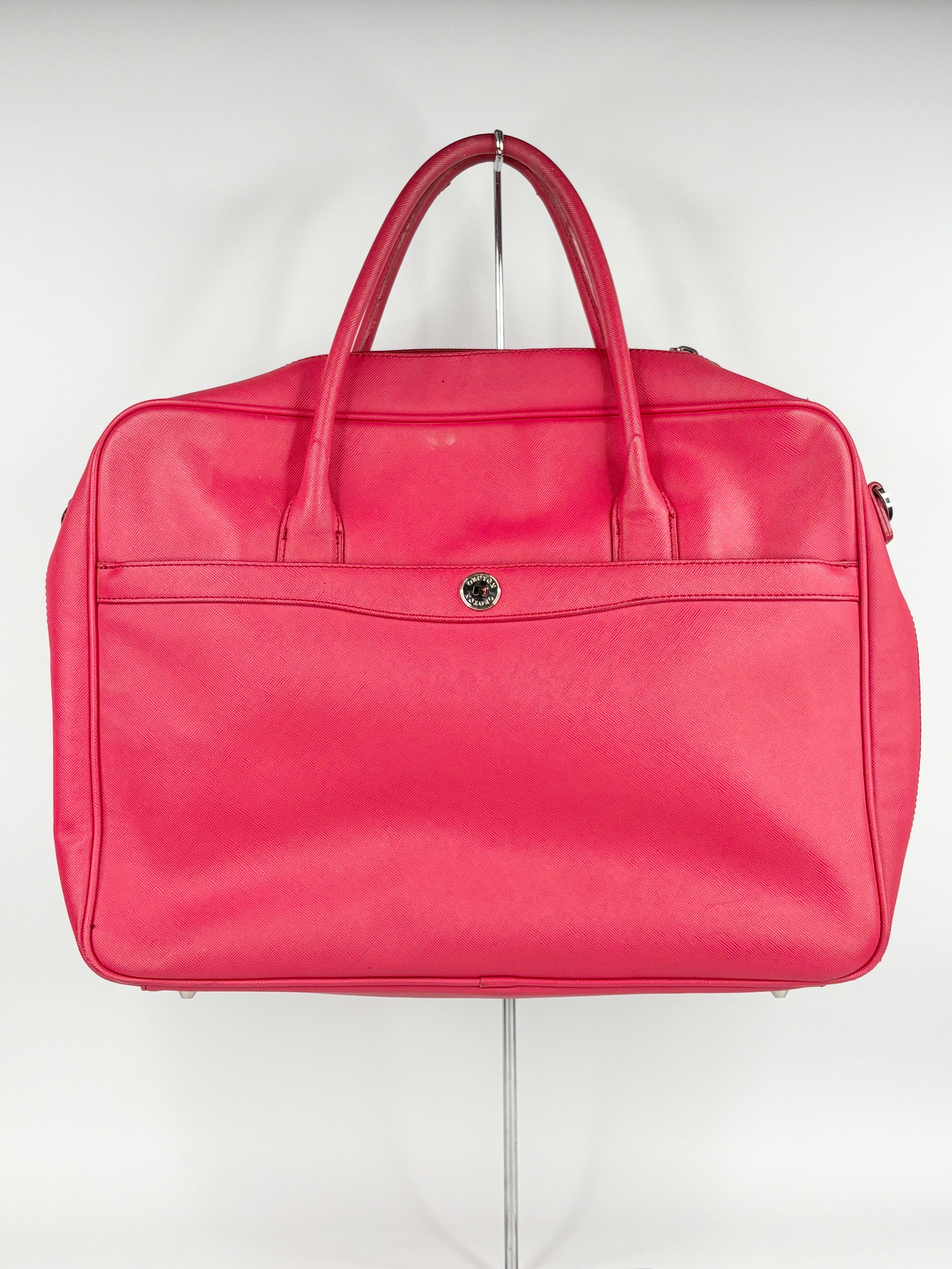 Oroton crimson travel bag on a white background