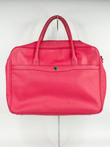 Oroton crimson travel bag on a white background