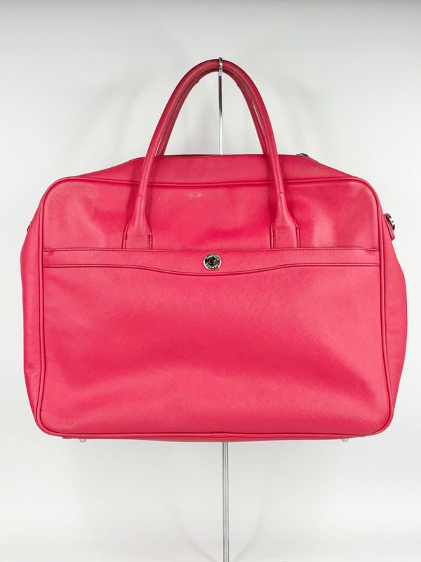 Oroton crimson travel bag on a white background