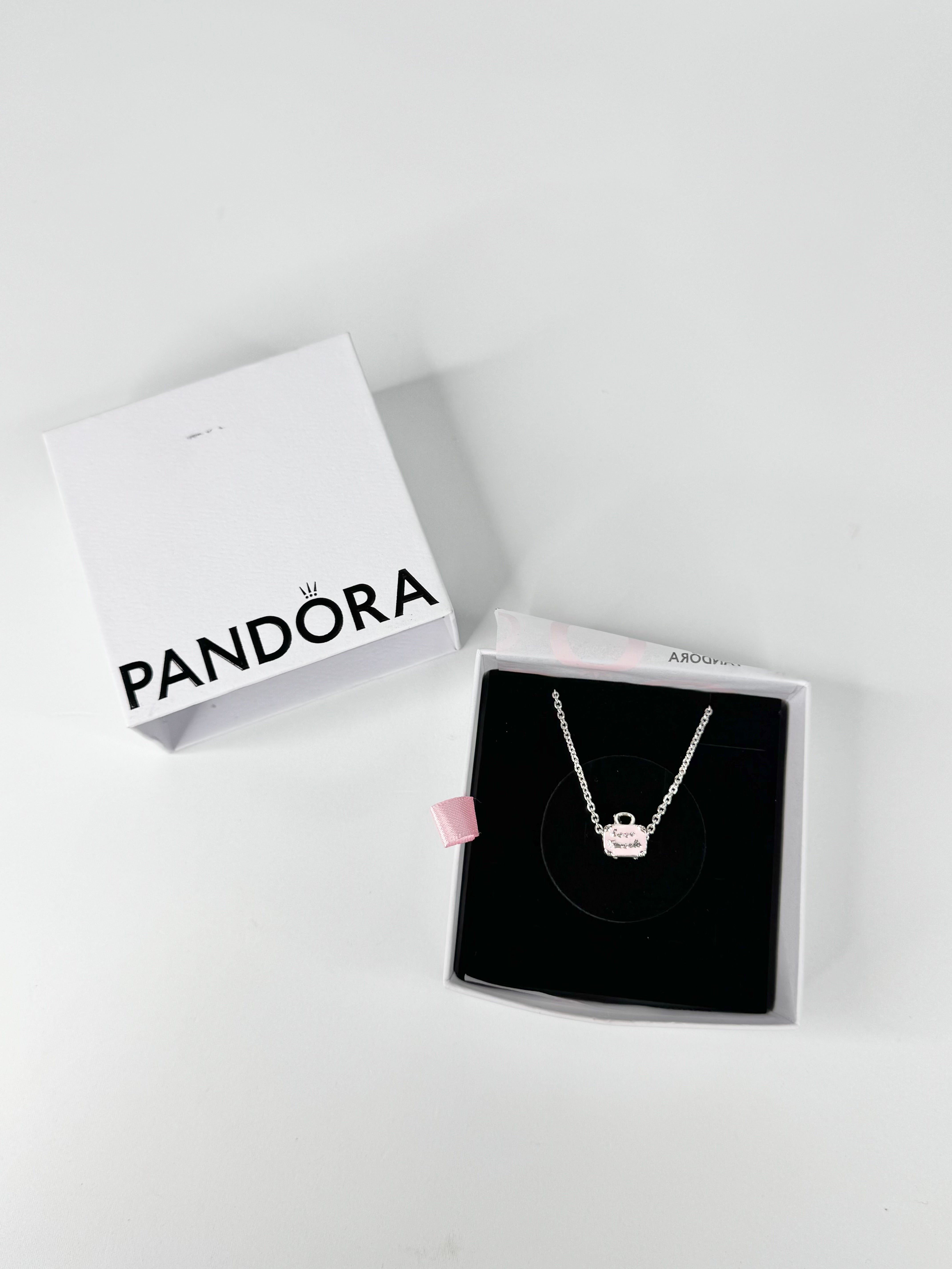 Pandora necklace in a box on a white background