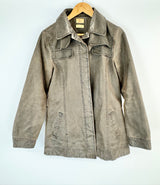 Brown jacket on a hanger against a white background