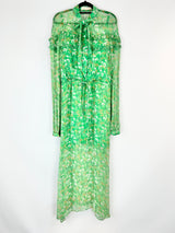 Green floral maxi dress on a white background