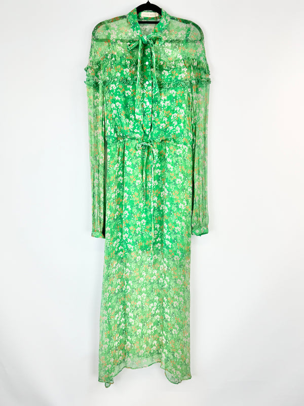 Green floral maxi dress on a white background