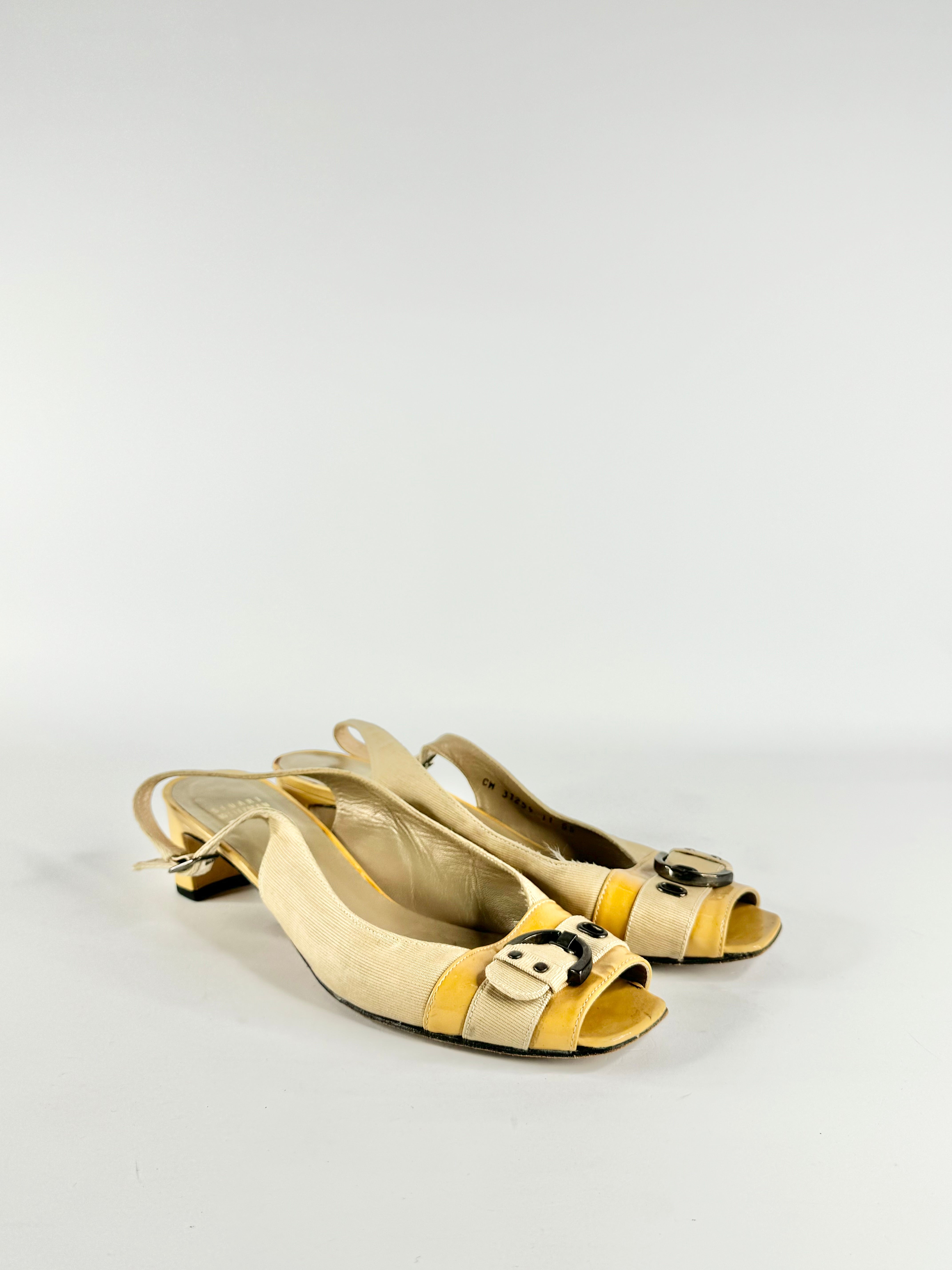 A pair of beige peep toe sling back heels with yellow leather heel and straps.